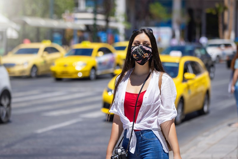 WOMAN WEARING PROTECTION MASK
