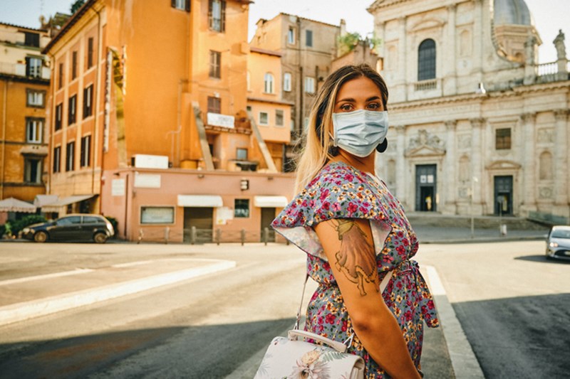 WOMAN WITH PROTECTIVE MASK