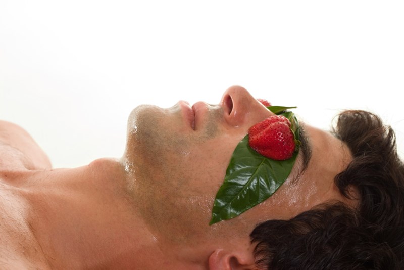 MAN WITH MOISTURIZING MASK ON HIS FACE