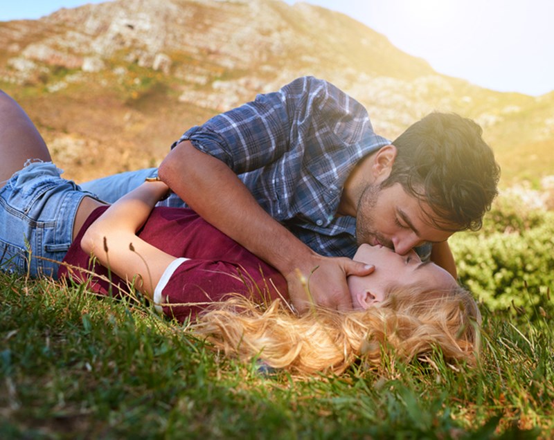 YOUNG COUPLE ENJOYING A DAY OUTDOORS