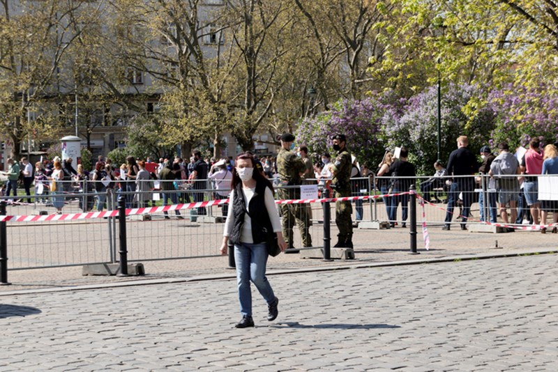PEOPLE WEARING PROTECTIVE FACE MASKS
