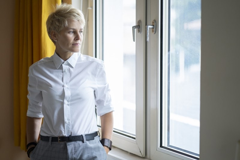 WOMAN IN WHITE SHIRT