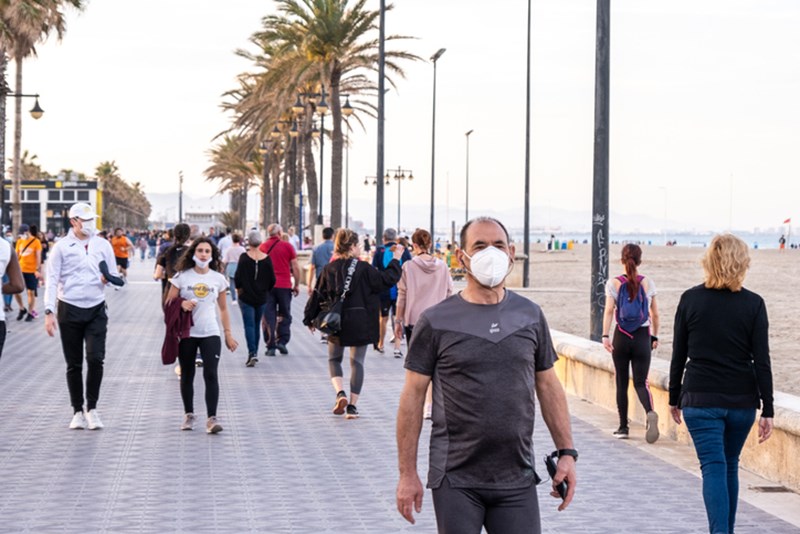 PEOPLE WEARING PROTECTIVE FACE MASKS