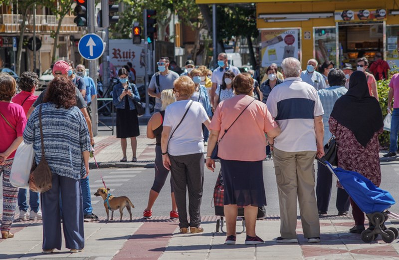 PEOPLE WEARING PROTECTIVE FACE MASKS