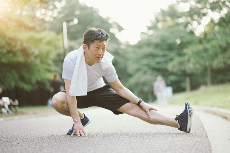 ASIAN MAN EXERCISING