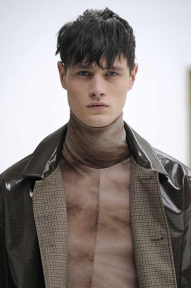 MALE MODEL WITH INTERESTING HAIRCUT