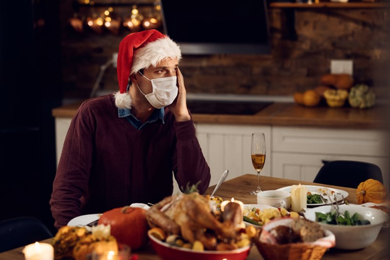SAD MAN AT CHRISTMAS TABLE