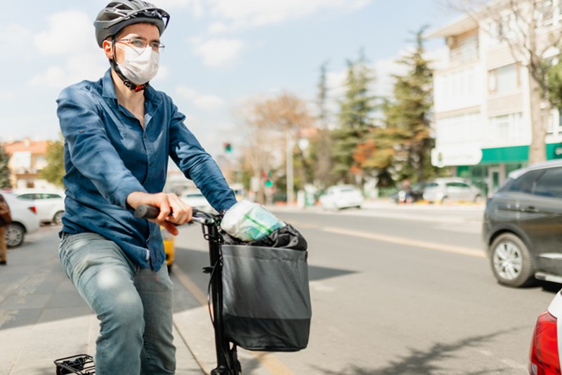 MAN WITH PROTECTIVE FACE MASK