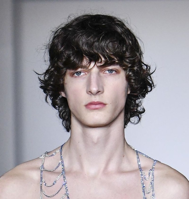 MALE MODEL WITH INTERESTING HAIRCUT