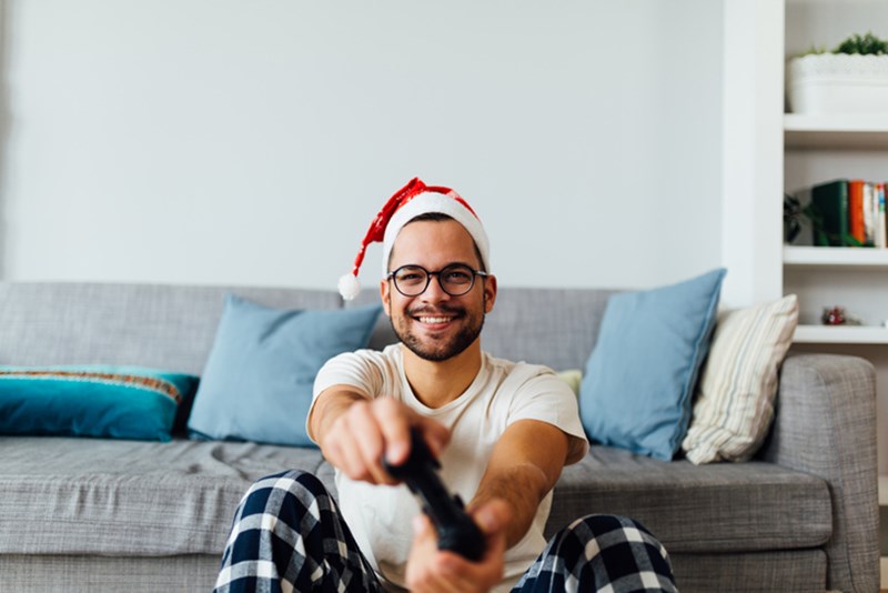 MAN PLAYING VIDEO GAMES