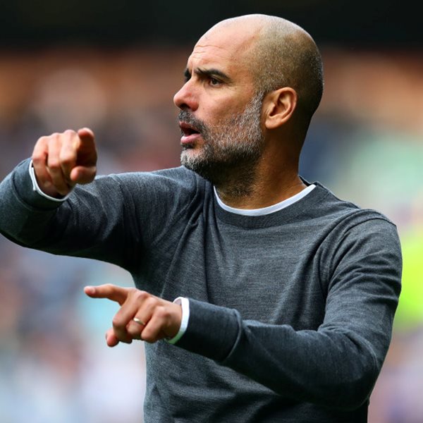 To preppy layering look του Pep Guardiola